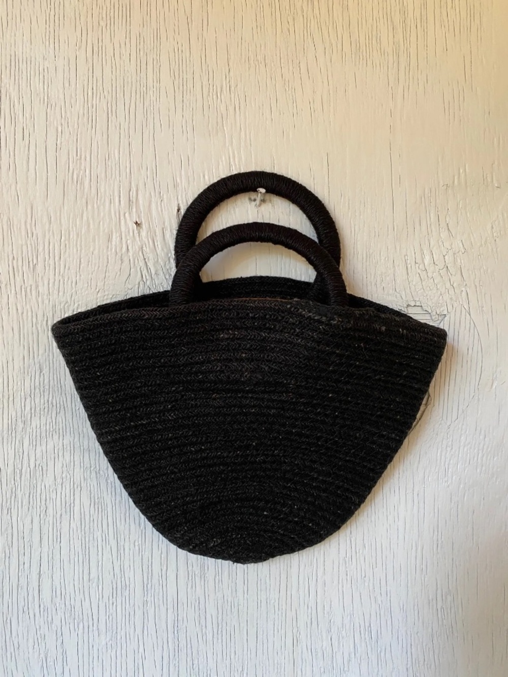 Reformation black woven clutch